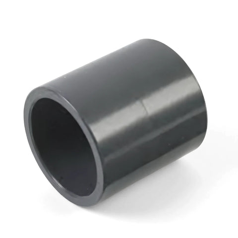 Dark gray 32mm PVC straight connector fitting, shown from an angled perspective, for joining pipes in plumbing.