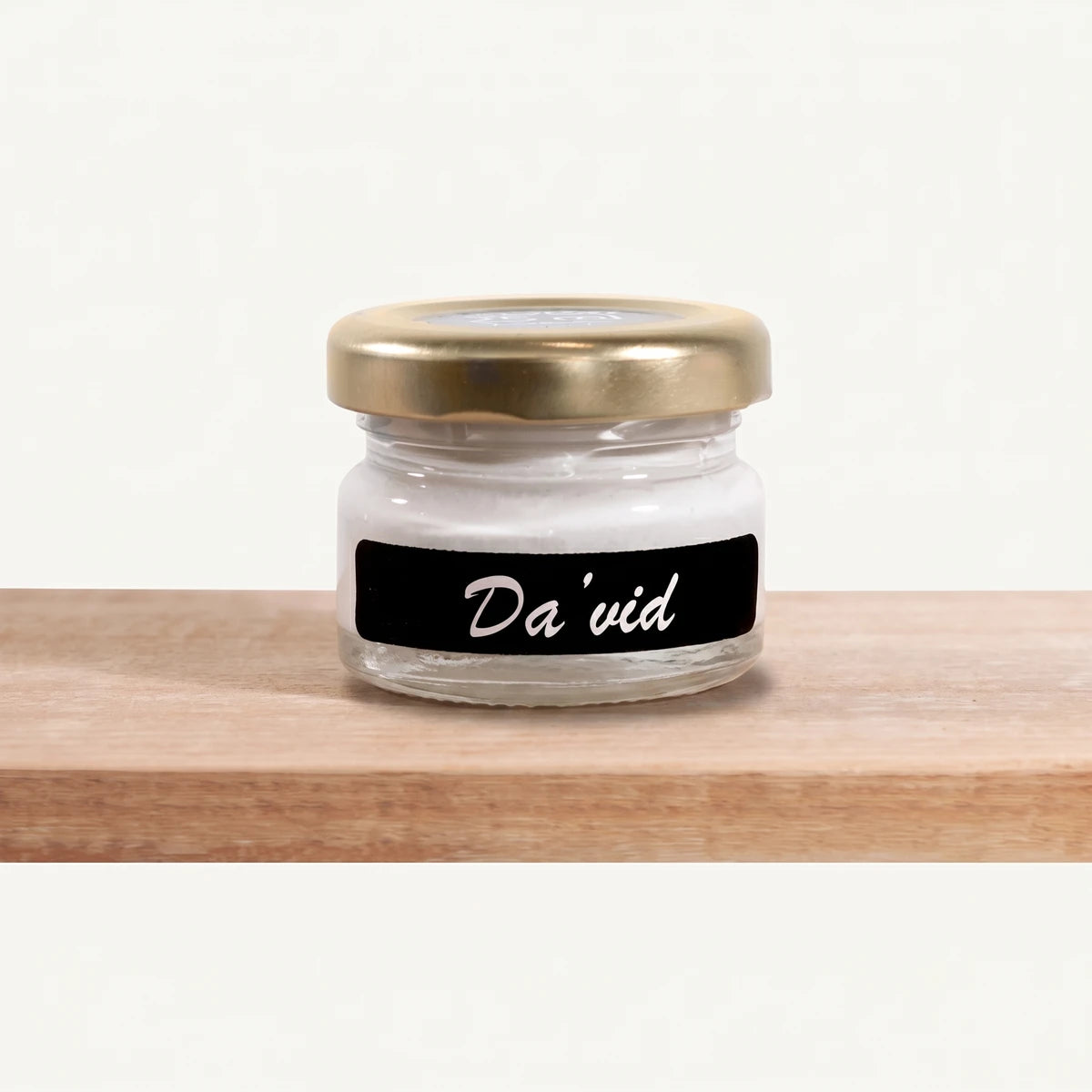 Small clear glass jar of Da'Vid 25ml Chalk Paint with a gold lid and a black label, displayed on a wooden shelf.