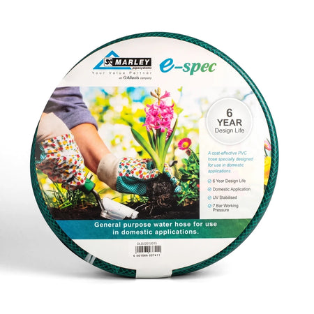 Green E-Spec Garden Hose, 20mm x 20M, coiled with a product label featuring gloved hands planting a pink flower and key