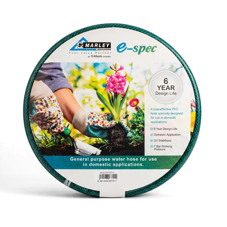 Coiled green E-Spec garden hose with a label featuring hands planting a pink hyacinth. Designed for domestic applications.