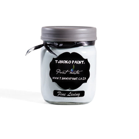 Fine Lining 500ml Chalk Paint jar in light blue-grey with a black label, resting on a wooden shelf.
