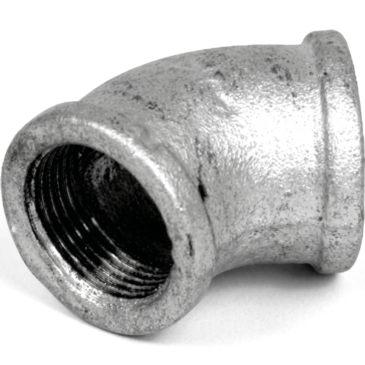 Galvanized 1/2-inch 45-degree female x female elbow pipe fitting, made of durable metal, shown in a close-up.