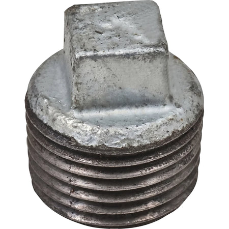 Close-up view of a metal galvanized plug with a threaded body and square drive head, suitable for plumbing.