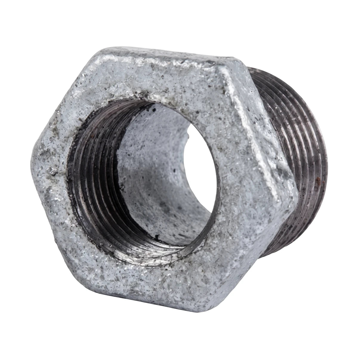 A hexagonal galvanized reducing bush with visible threading on both ends, shown from a slight angle, metallic gray in color,