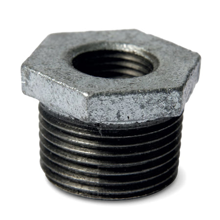 Galvanized reducing bush, metal, with hexagonal head and threaded exterior for plumbing connections.