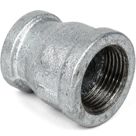 Galvanized reducing socket, 1 by 3/4 inch, a metal pipe fitting with a threaded interior.
