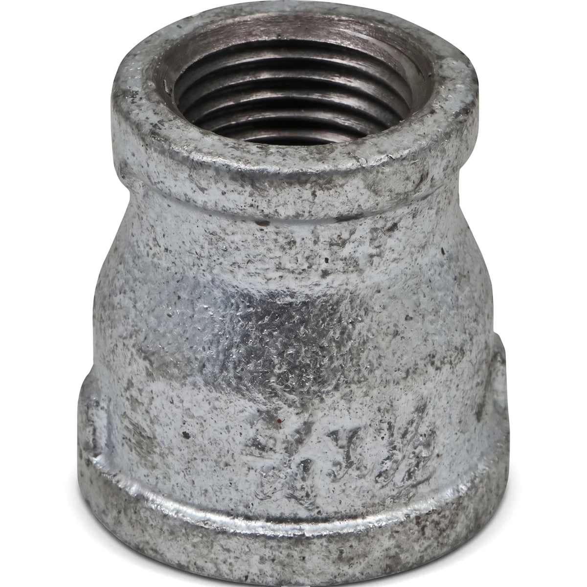 Galvanized reducing socket, 3/4 by 1/2 inch, metal pipe fitting with internal threads for plumbing.