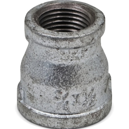 Galvanized reducing socket, 3/4 by 1/2 inch, metal pipe fitting with internal threads for plumbing.
