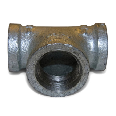 Galvanized reducing tee pipe fitting, 1/2 x 1/2 x 3/4 inch, with threaded openings for plumbing connections.