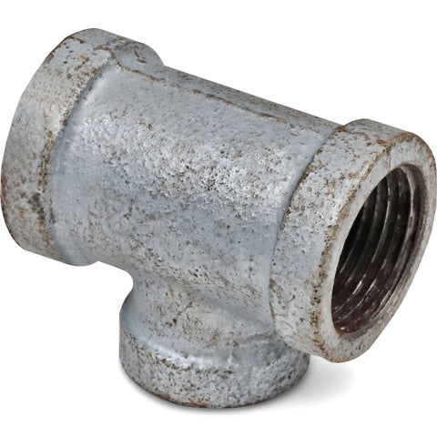 A close-up view of a gray galvanized reducing tee pipe fitting, featuring three threaded openings and a textured metallic
