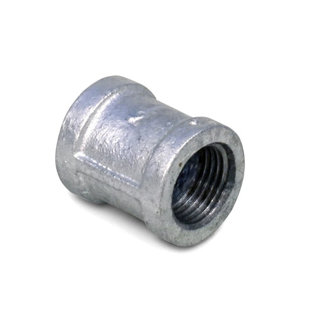 Galvanized socket fitting with internal threading, durable silver metal, ideal for connecting pipes or fittings.