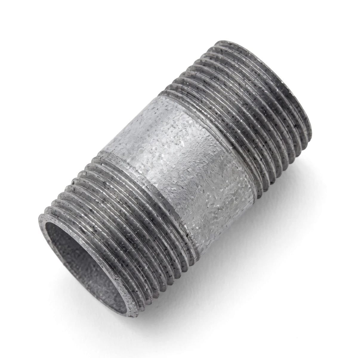 A close-up view of a silver galvanized steel nipple barrel, featuring coarse threading on both ends and a smooth central