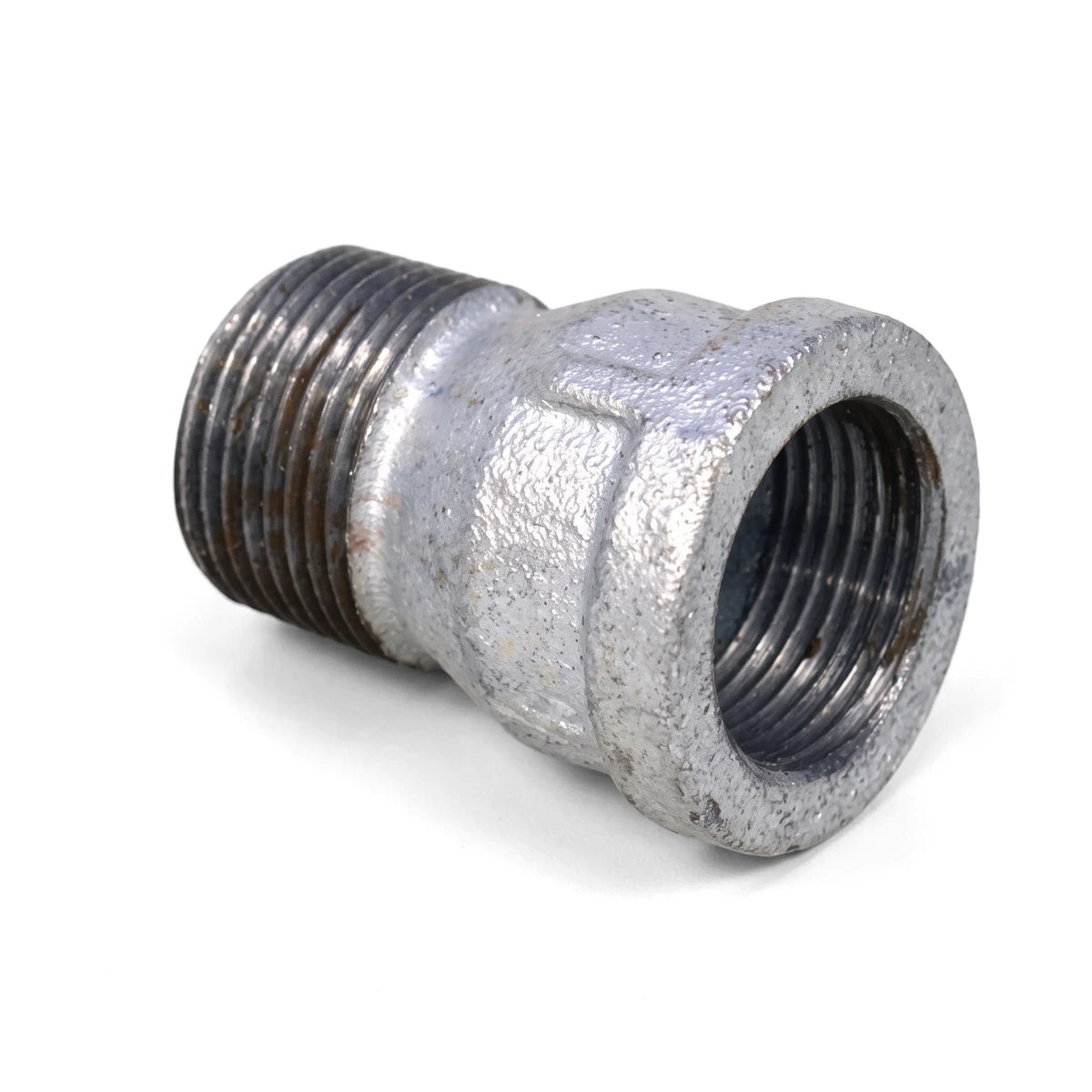 Close-up of a metallic gray galvanized straight MF fitting, with male threading on one end and female threading on the other
