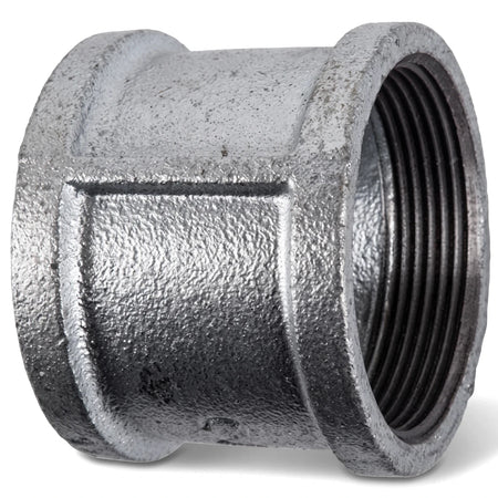 Gray galvanized threaded pipe socket, a durable metal plumbing component for joining pipes, shown on a white background.