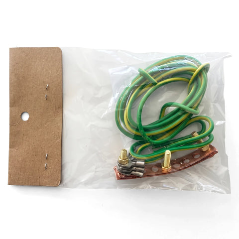 Geyser Earthing Kit with coiled green and yellow wire, copper earthing bar, and cardboard tag in a clear plastic bag.