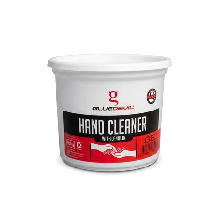 A white plastic tub of Glue Devil Gel Hand Cleaner with Lanolin, 500g, featuring a black and red label, on a white