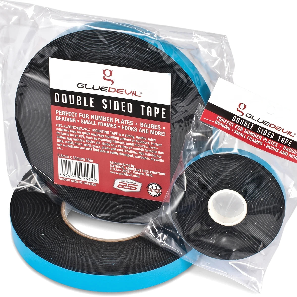 Double-sided black GlueDevil mounting tape rolls in clear plastic packaging, shown from a slight overhead angle.