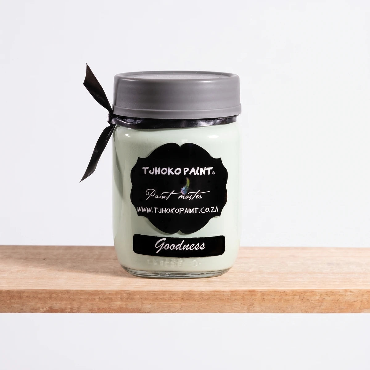 Goodness 250ml Chalk Paint in a glass jar with a black label and grey lid, offering a light green/mint color.
