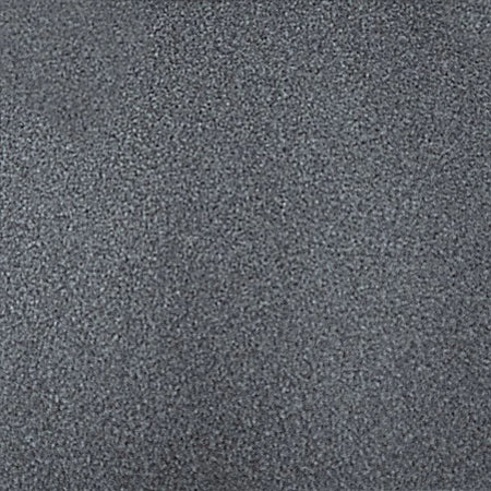 Close-up view of a dark grey granular charcoal granite tile, showcasing its textured surface.