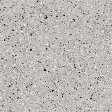 Close-up of a Granito Dark Grey tile showcasing its speckled granular texture with various shades of grey, black, and white.