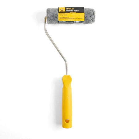 Gray fuzzy paint roller with a bright yellow ergonomic handle and a silver metal frame on a white background.