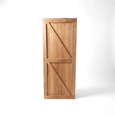 Light brown hardwood door with vertical planks and a distinctive Z-brace design, viewed head-on. Ideal for interior or