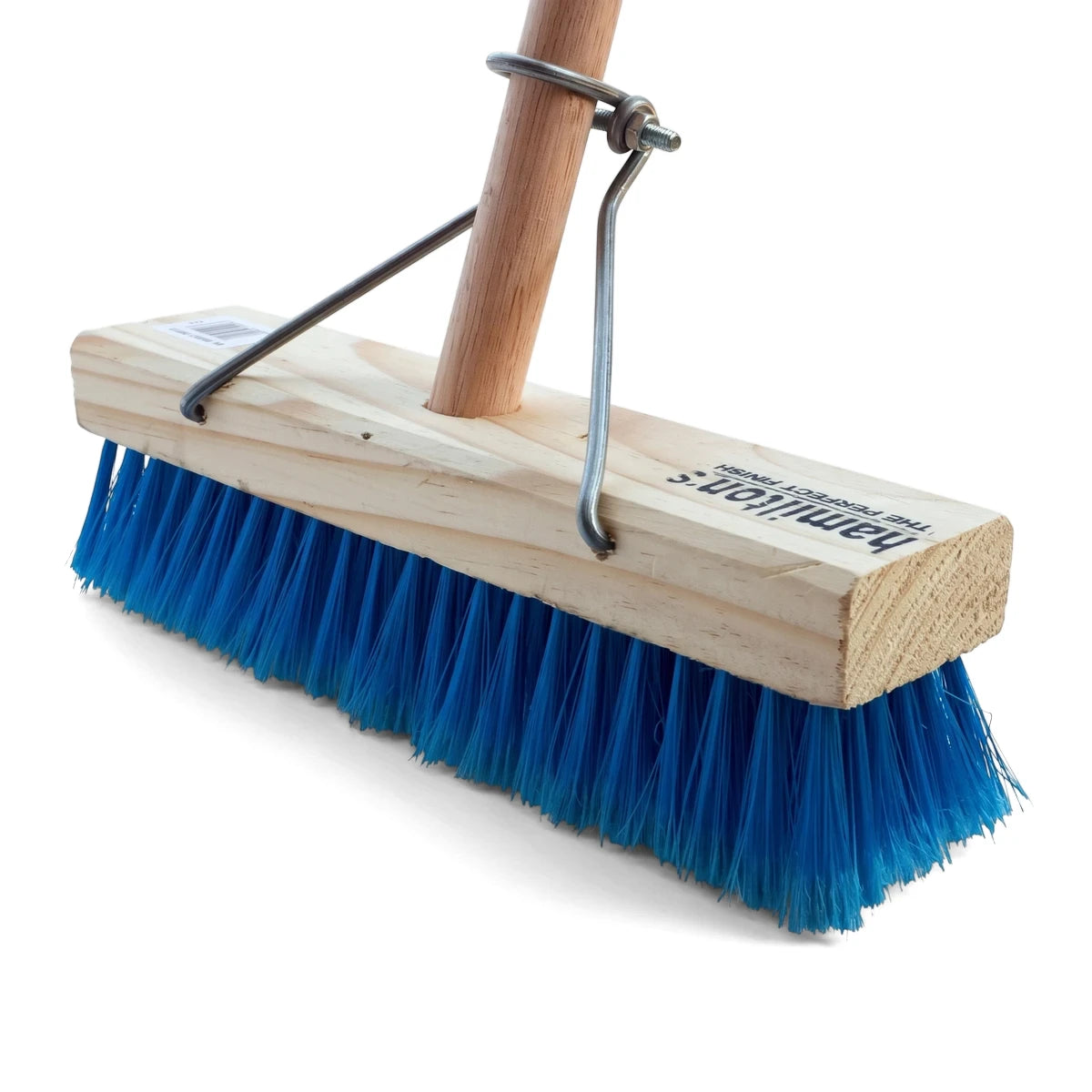 Close-up of a heavy-duty household broom, featuring vibrant blue synthetic bristles and a sturdy light-colored wooden block