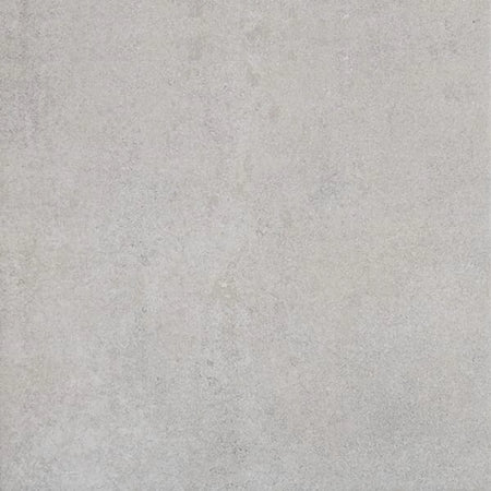 Close-up of a Highlands Mist tile, showcasing its light grey, textured surface with a subtle, speckled pattern.
