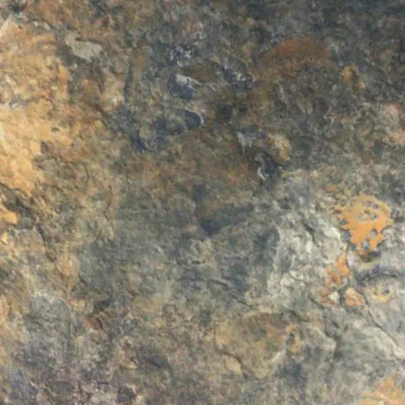 Close-up of Ikapa Cobal natural stone tiles, showcasing their textured surface with multi-toned brown, gray, orange, and