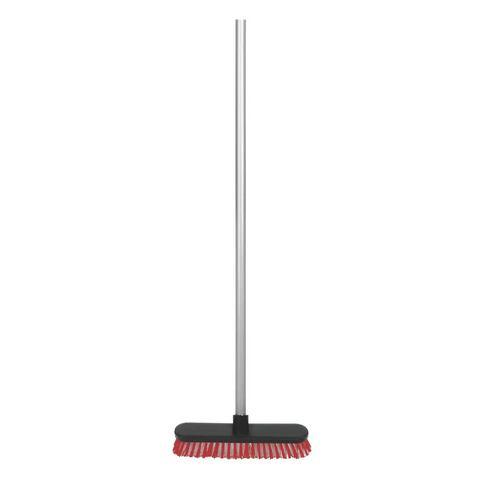 addis deck broom with red short stiff bristles and silver handle