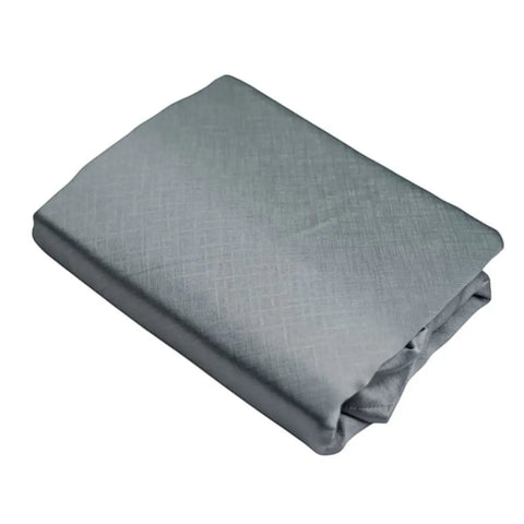 folded charcoal grey blockout curtain with taped header and subtle texture