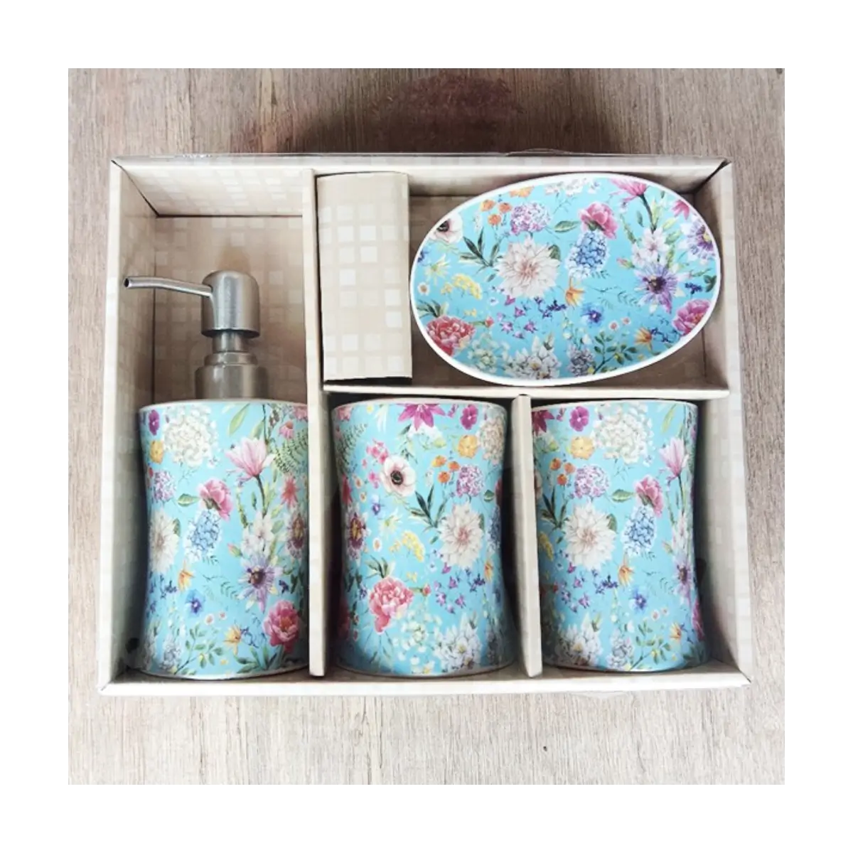 Four piece bathroom accessory set