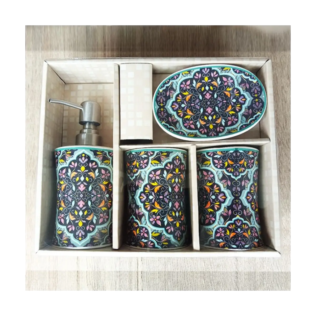 Four piece bathroom accessory set