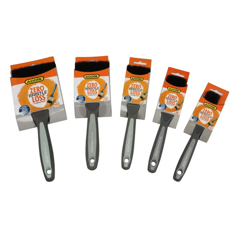 five addis zero bristle loss paint brushes with grey handles and orange packaging