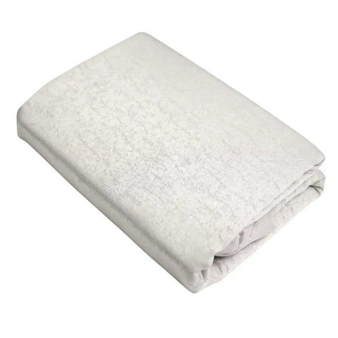 folded off white terry cloth towel showing plush texture