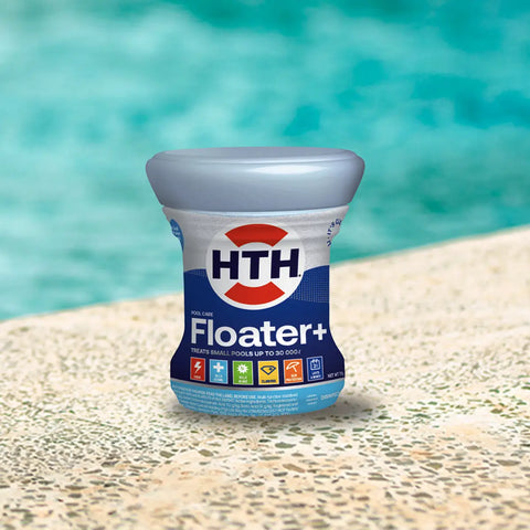 HTH Floater plus container on a poolside deck with turquoise water behind