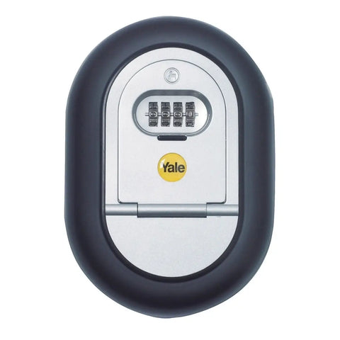 Yale combination lock with five rotating dials on a silver panel, housed in a black oval outer shell