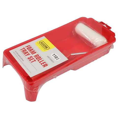 red plastic paint tray with a white foam roller in clear packaging