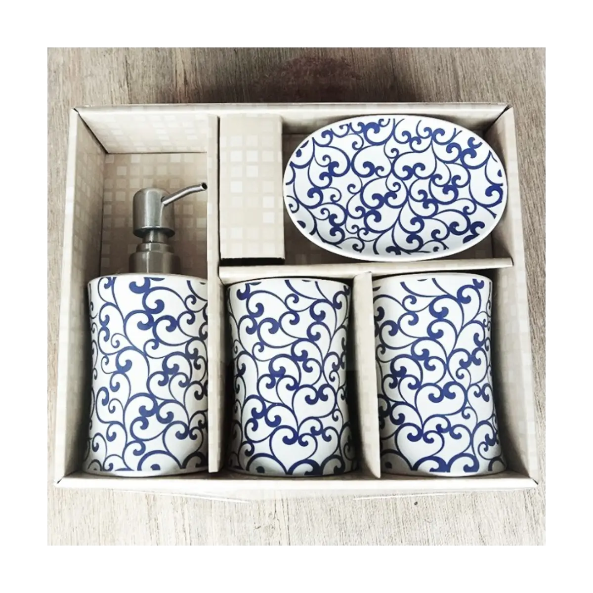 Four piece bathroom accessory set