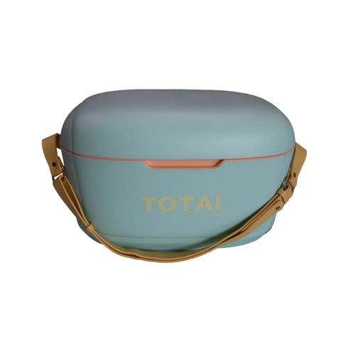 mint cooler box by Totai with a tan adjustable strap