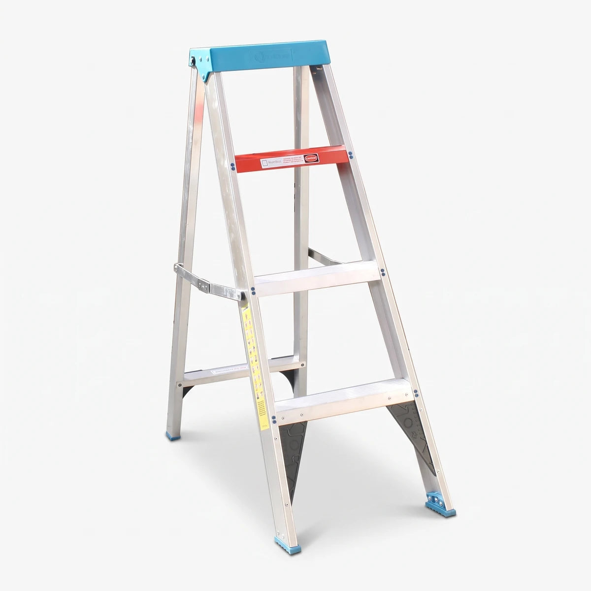 Industrial aluminium step ladder with blue top and feet caps, and a red caution label, standing upright.