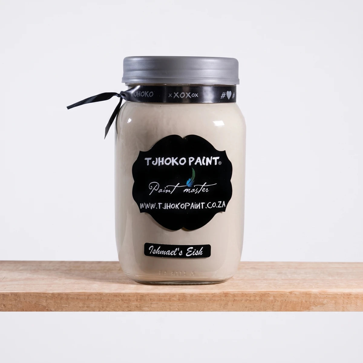 Ishmael's Eish 250ml Tjohoko Chalk Paint in a glass jar with a black label and silver lid, showcasing the light beige color.
