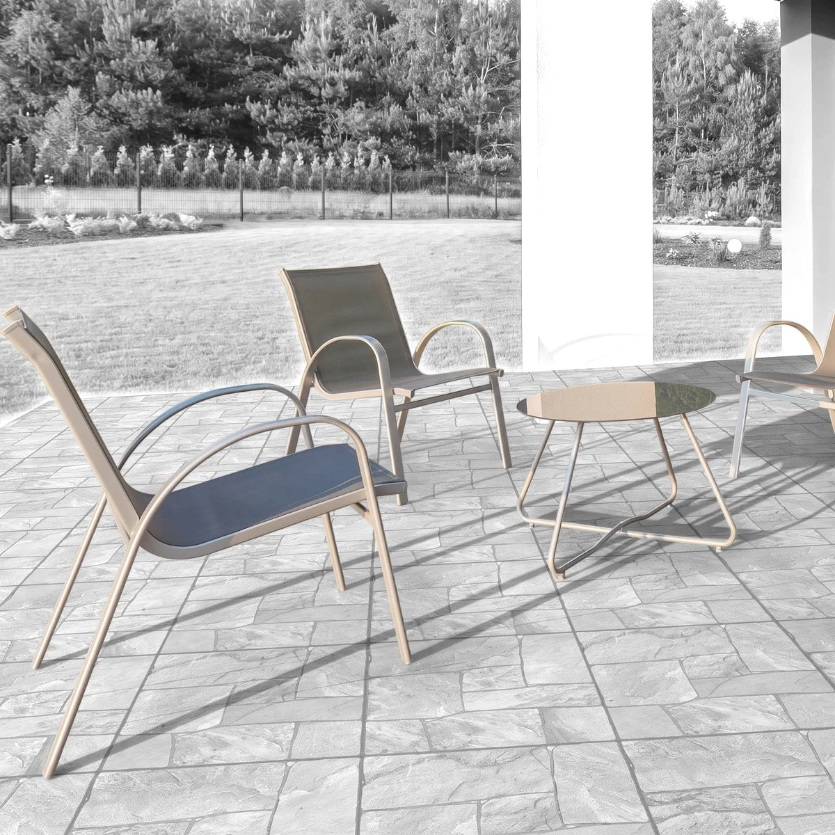 Natural Jabulapave cobblestone 50x50cm tiles laid on a patio, with gray metal outdoor chairs and a glass table.