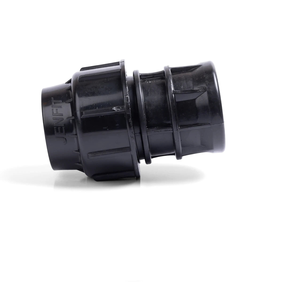 Black Jenfit adapter, a 20mm x 1" plastic pipe fitting for plumbing and irrigation systems, shown on a white background.
