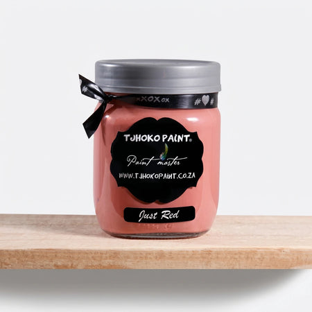 Just Red 500ml Chalk Paint in a glass jar with a gray lid and black label, sitting on a wooden shelf.