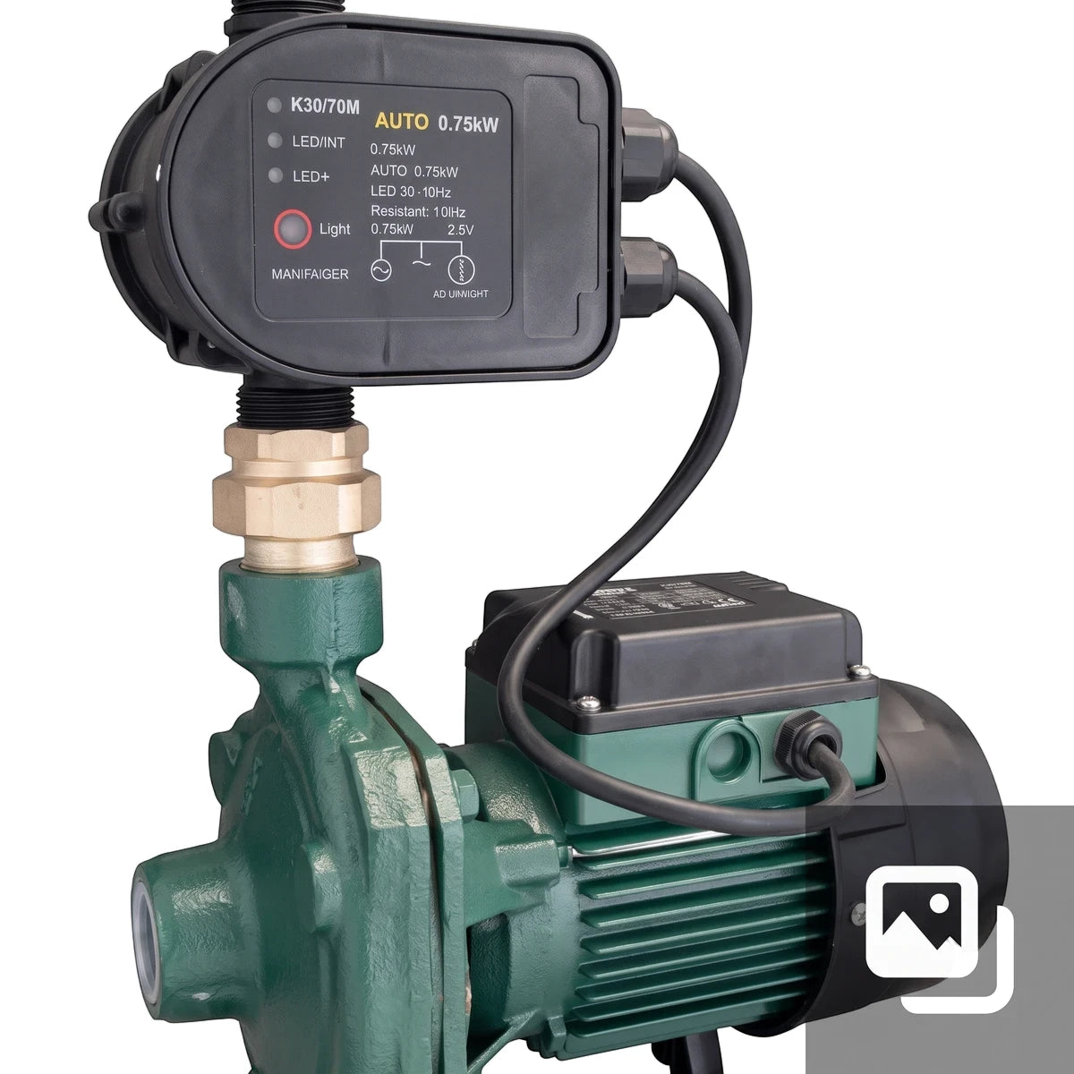 Green K30/70M AUTO 0.75kW water pump with a black control unit and brass fitting, seen from a slightly elevated angle.