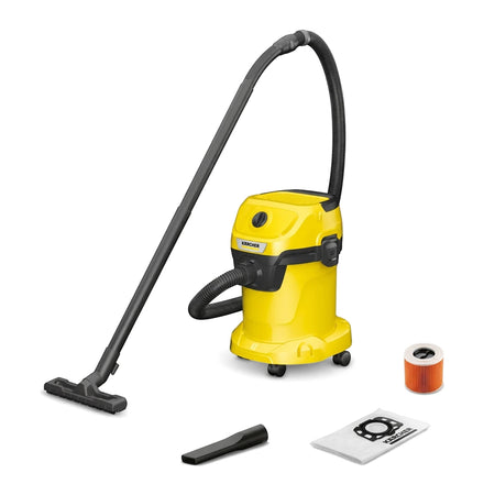 A yellow and black Karcher Wet and Dry Vacuum Cleaner with its hose, floor nozzle, crevice tool, filter, and dust bag on a