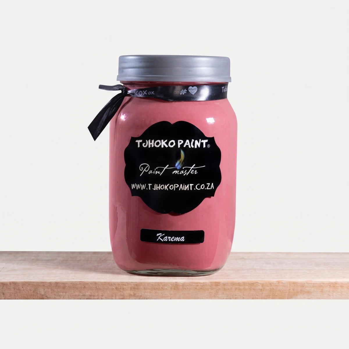 Karema 500ml Tjohoko Chalk Paint in a clear glass jar with a silver lid, showcasing its reddish-pink hue.
