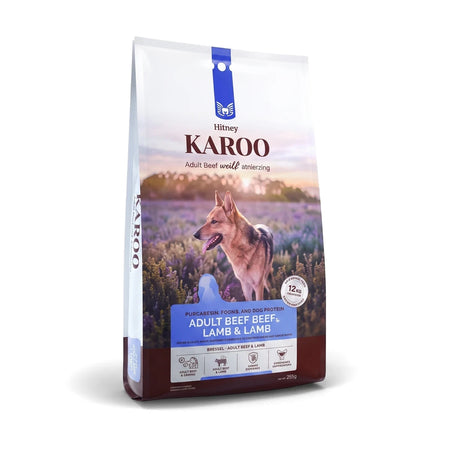 Karoo Adult Beef & Lamb Dog Food in a white and blue bag featuring an illustration of a dog, viewed from a slight angle.