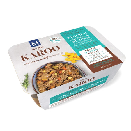 Montego Karoo Wet Adult Salmon & Pumpkin Dog Food slow-cooked stew in a tray with rosemary and mango.